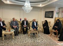 دیدار استاندار گیلان و جمعی از مسئولان با خانواده شهید علی اخوین انصاری